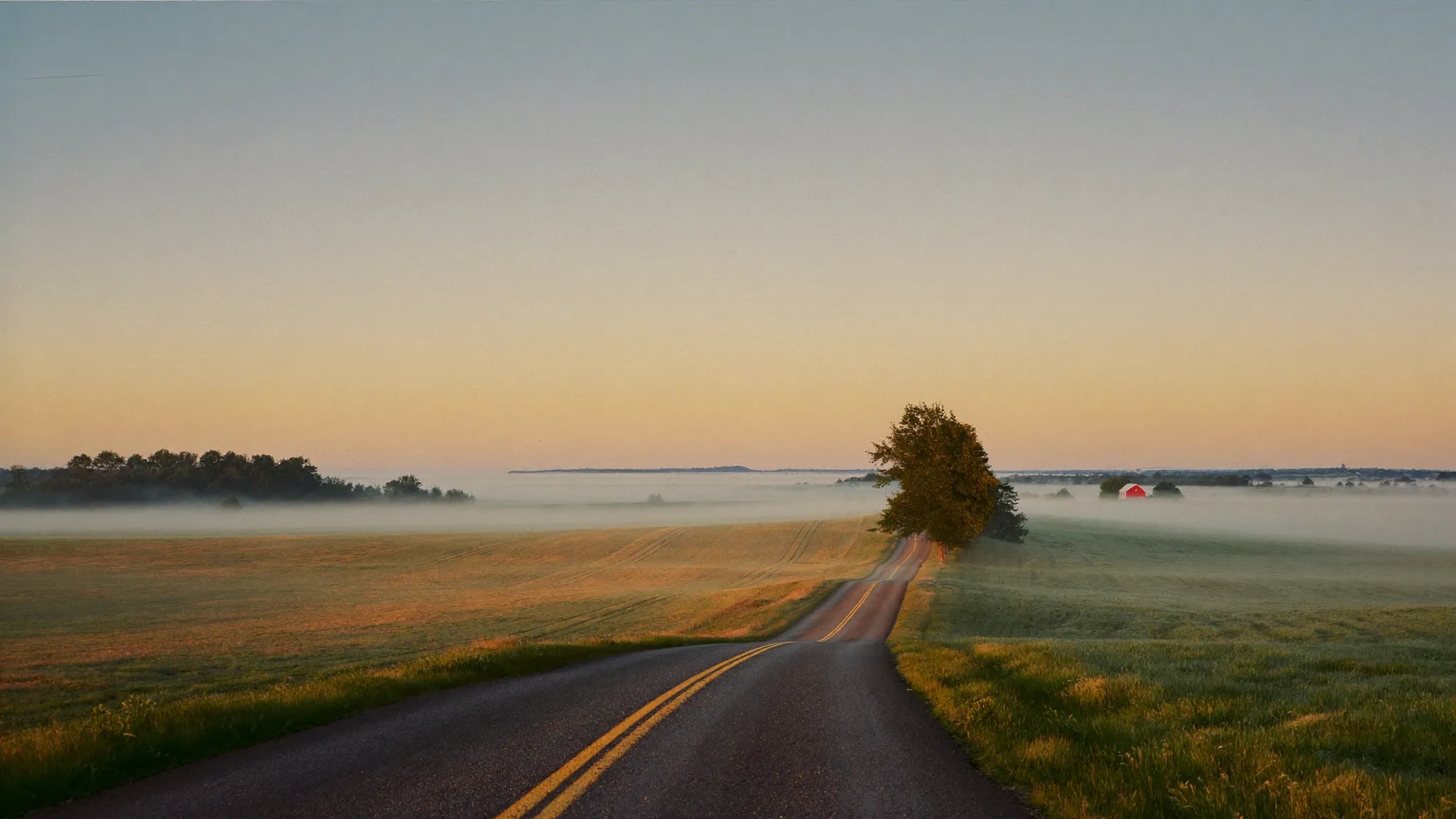 Country road through Pennsylvania farmland at dawn